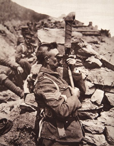 In the British trenches at Salonika: a sergeant using his periscope by English Photographer